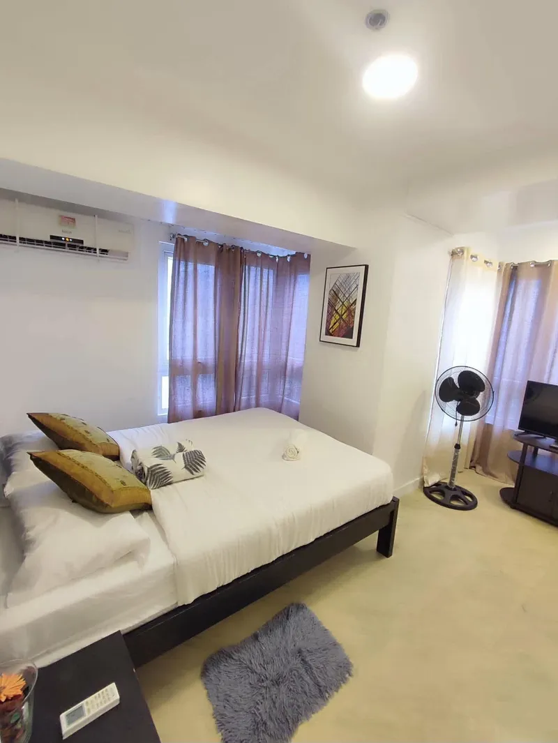 Modern bi-level condo with city views in Makati's CBD - 2 bedrooms